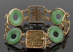 Chinese jade and gold bracelet, with alternating hoops of jade and Chinese characters, with solid