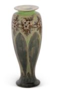 A Royal Doulton vase by Elisa Simmance decorated with flowers in a Art Nouveau style on green