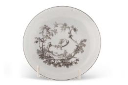 A Worcester porcelain saucer circa 1765 decorated with a rare print of Chinese acrobats, 11cm