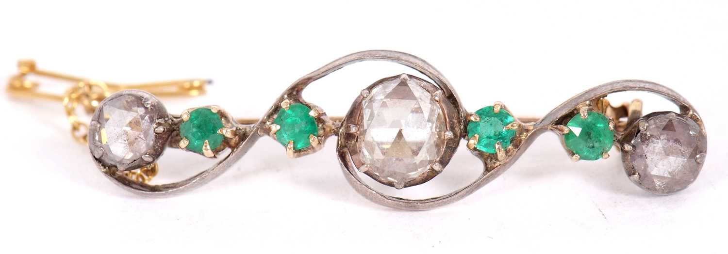 An emerald and diamond brooch, set with a central rose cut diamond, approx. 7.6mm diameter x 2.2mm - Image 5 of 8