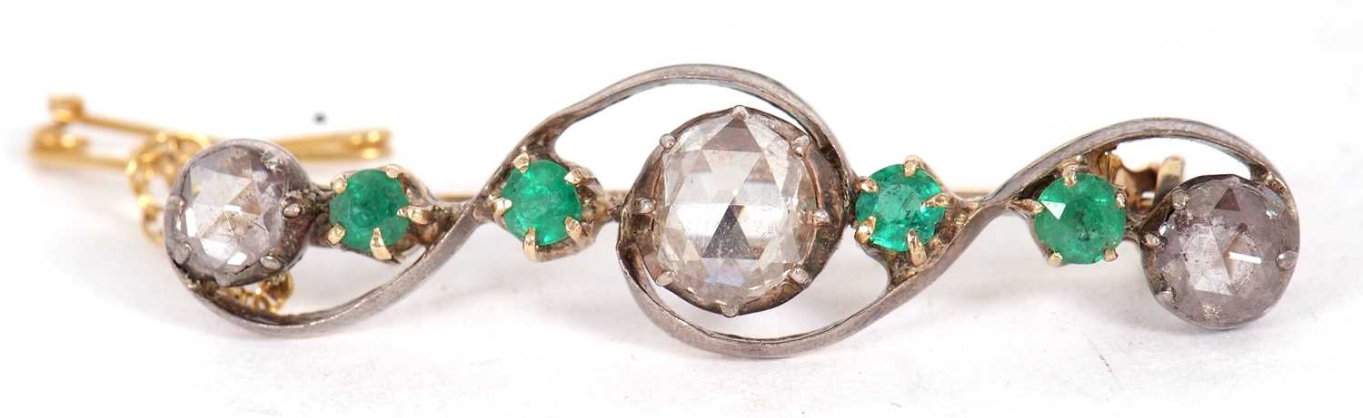 An emerald and diamond brooch, set with a central rose cut diamond, approx. 7.6mm diameter x 2.2mm - Image 6 of 8