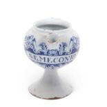 A Delft wet drug jar circa 1740 probably London of globular form on spreading foot with loop