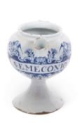 A Delft wet drug jar circa 1740 probably London of globular form on spreading foot with loop