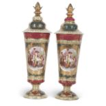 A pair of Vienna vases and covers with panels of classical ladies after Kaufmann surrounded by