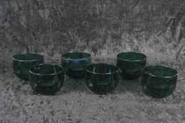 A rare set of six George IV Bristol green glass finger bowls, unusually moulded with a chrysanthemum
