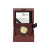 A Royal Mint 2017 quarter oz proof Britannia gold coin, limited number 0327, Royal Mint and outer