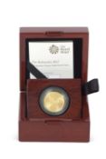A Royal Mint 2017 quarter oz proof Britannia gold coin, limited number 0327, Royal Mint and outer