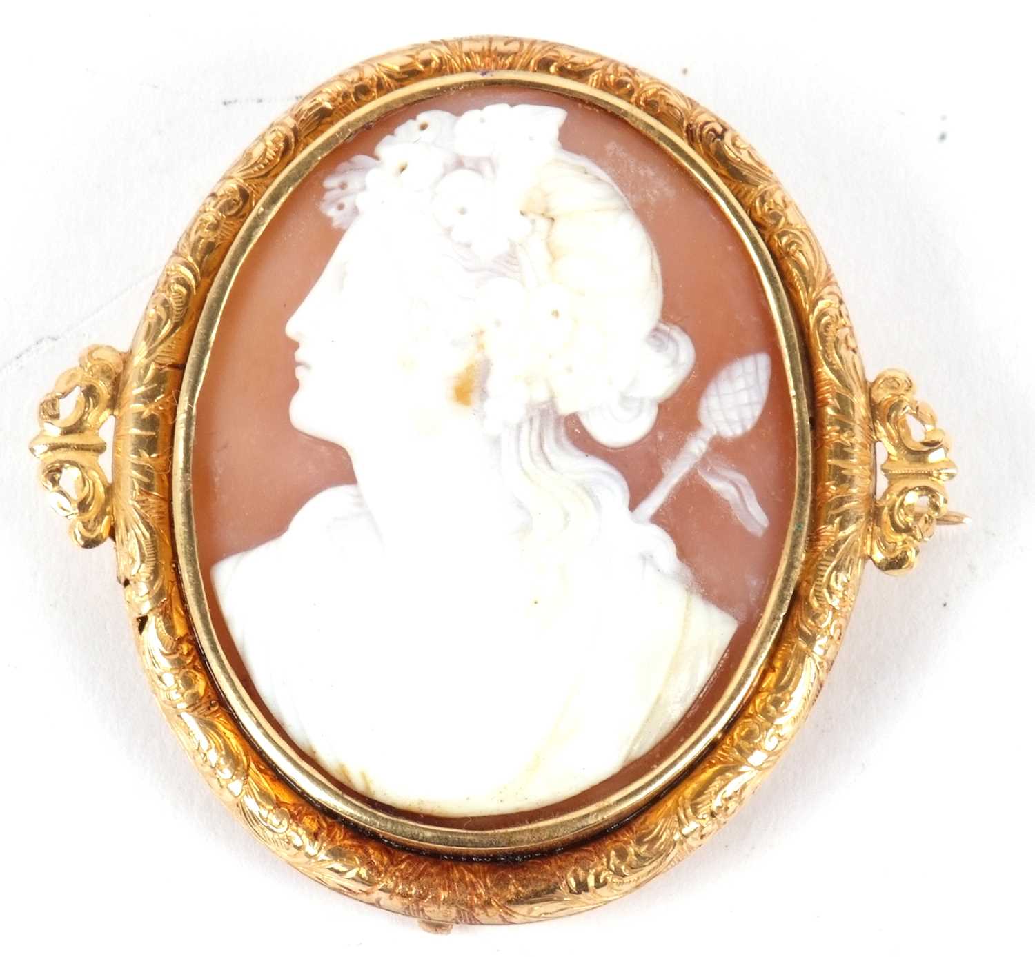 A cameo brooch, the oval shell cameo carved with the head of Dionysus, indistinctly initialled AJ to - Image 3 of 7