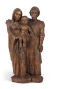 A contemporary carved oak figure group, Mary, Joseph and the baby Jesus, initialled AW to the