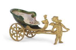 A 19th Century French enamel and ormolu chariot, it shows a standing winged cherub or putto