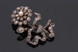 A Victorian diamond and 'pearl' flower brooch, the flower set to centre with a small round 'pearl'