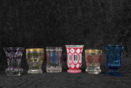 A group of six Bavarian glass vases all with typical coloured flashed decoration, one with panels