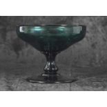 An early 19th Century Bristol green glass bowl raised on baluster stem and provenance with Gerald