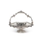A Victorian silver cake/fruit basket of circular form on pedestal foot with lobed body, the border
