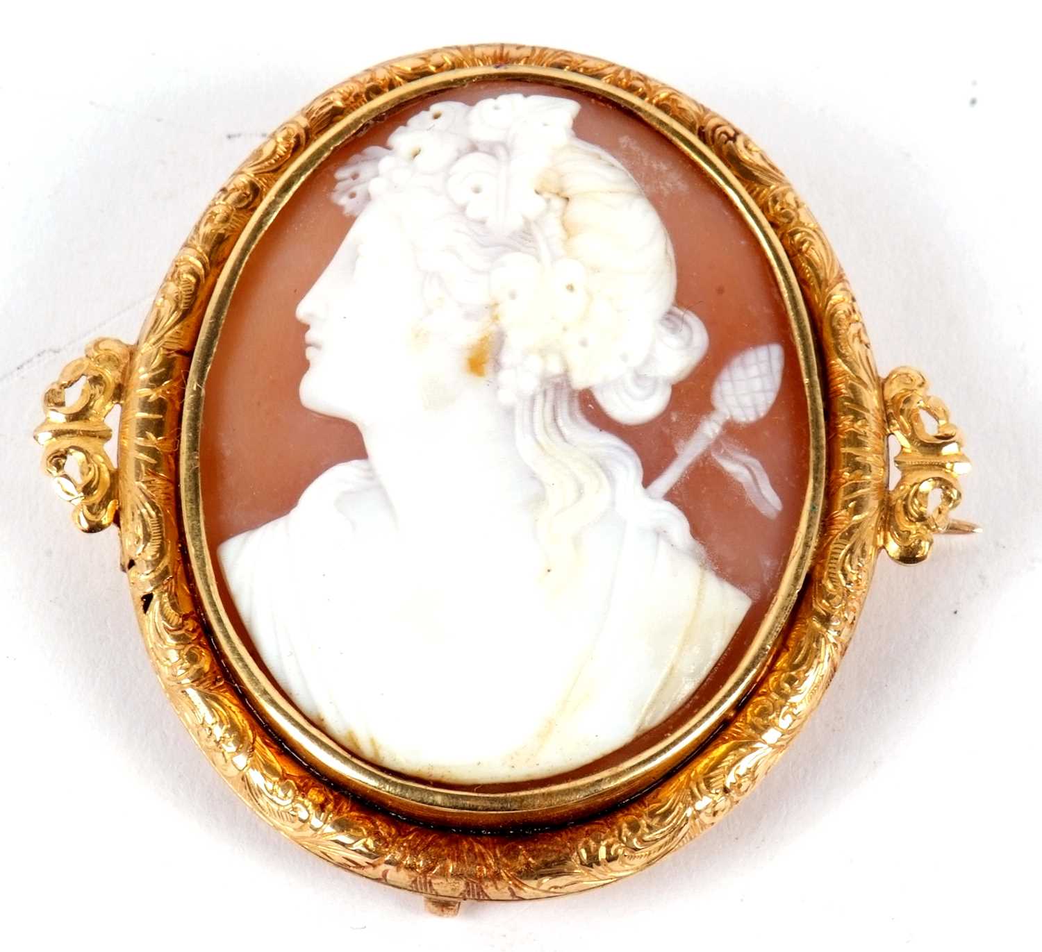 A cameo brooch, the oval shell cameo carved with the head of Dionysus, indistinctly initialled AJ to - Image 2 of 7