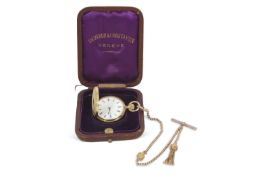 A Vacheron Constantin Geneve pocket watch and chain, the pocket watch is stamped 18k in the case