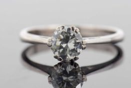 An 18ct white gold solitaire ring, the round brilliant cut diamond, estimated approx. 0.77cts,