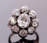 A 19th century diamond cluster ring, the central oval old European cut diamond, estimated approx.