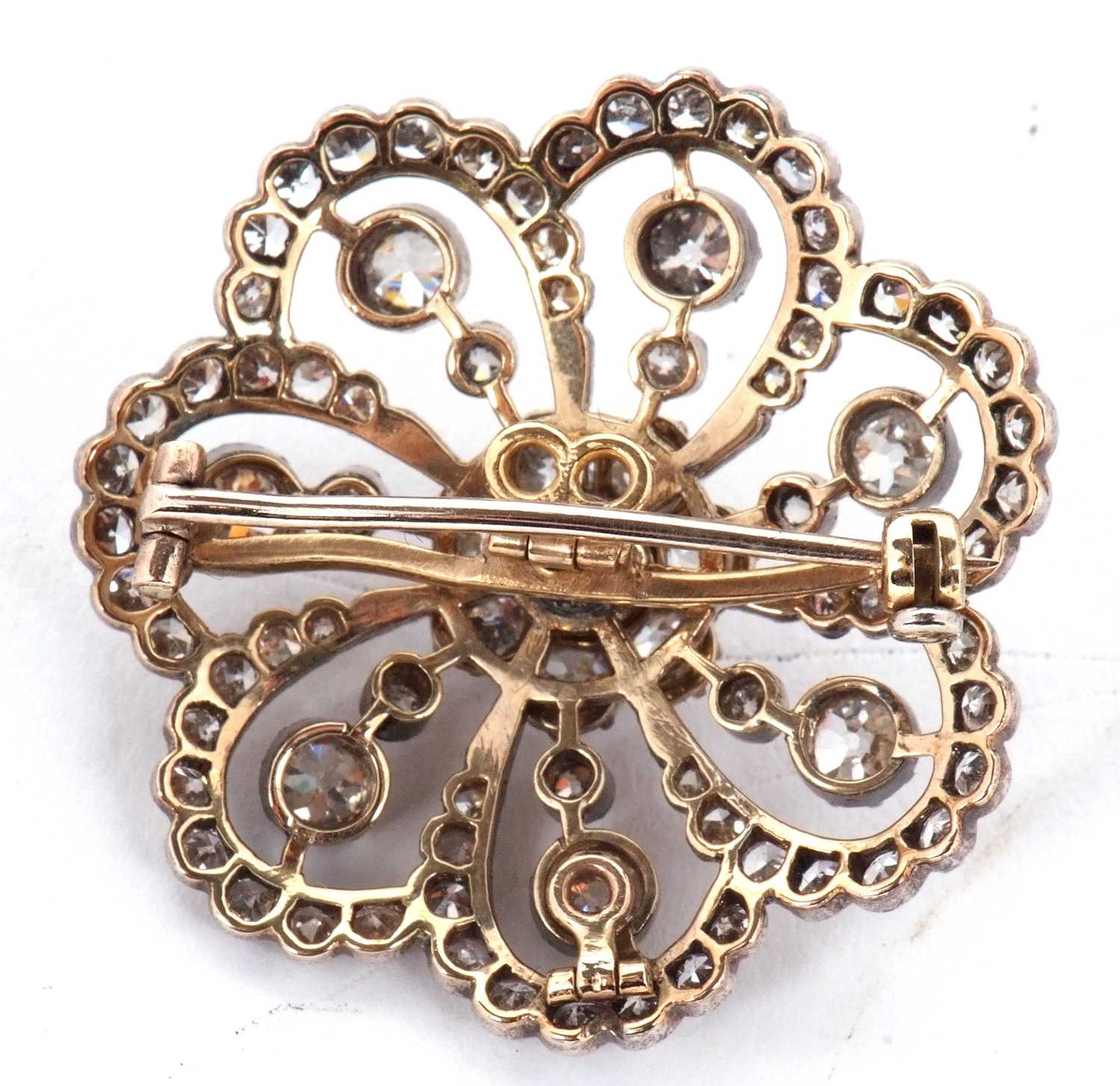 A late 19th/early 20th century diamond brooch, the central diamond flowerhead cluster, surrounded by - Image 5 of 8