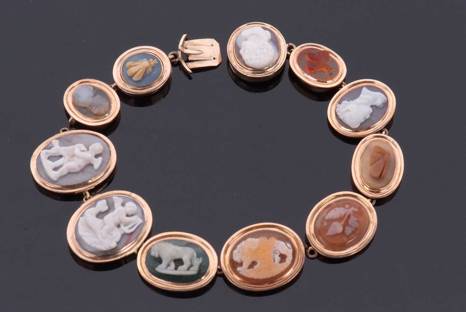 A hardstone cameo bracelet, set with oval hardstones carved with cherubs, animals, insects, portrait