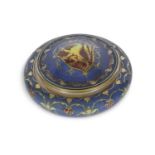 A Pilkington lustre bowl the blue ground with scrolling decoration as a cover with armorial sheld