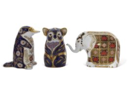 A group of three Royal Crown Derby paperweith, including an elephant, koala bear and platypus