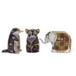 A group of three Royal Crown Derby paperweith, including an elephant, koala bear and platypus