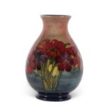 A mid 20th century Moorcroft vase of baluster shape decorated with the Spring Flowers pattern in a