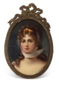 A small KPM style plaque finely painted with a portrait of a young lady in gilt scroll frame with