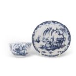 An early Lowestoft porcelain tea bowl and saucer with the boy on the bridge pattern, the saucer 12cm