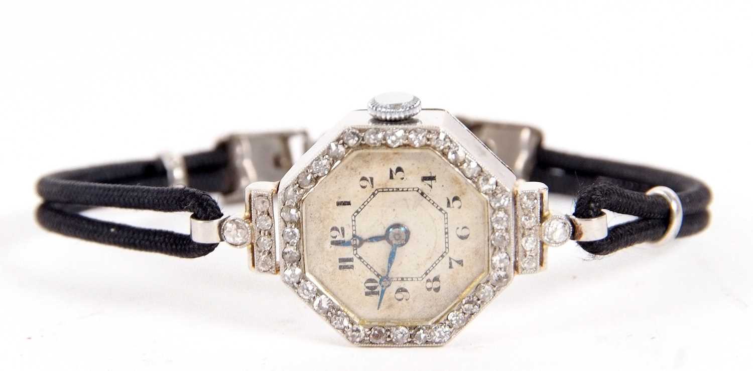 An Art Deco precious metal ladies wristwatch with old cut diamond bezel surround, it has a crown - Image 2 of 6