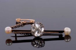 A diamond and 'pearl' bar brooch, the centre set with rose cut diamonds, total estimated approx. 1.