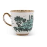 A Worcester porcelain cup decorated in green camaieu with a church and landscape scene, possibly