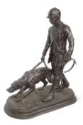 After Pierre-Jules Mene - a large bronze figure of a huntsman and hound set on a circular plinth