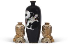 Cloisonne vase of quatre lobe form decorated with a sinuous dragon in white chasing the flaming
