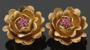 A pair of gemset floral earclips, the stylised cottage garden roses set to centre with pink