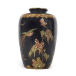 An early Carlton ware Famille Noire vase decorated in Art Deco style with a pheonix amongst