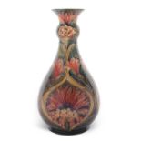 A good early 20th century Moorcroft vase of baluster shape with collar neck, decorated with the