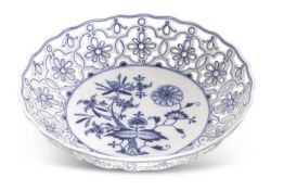 A large Meissen porcelain dish decorated with the onion pattern within pierced floral borders,