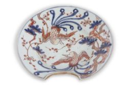 A Chinese porcelain barbers bowl , possibly Japanese, decorated in underglaze blue and iron red with