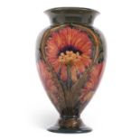 An impressive large Moorcroft pottery vase, early 20th century of baluster form decorated with the