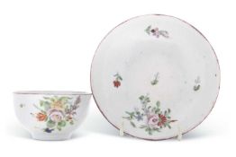 18th Century Bristol hard paste tea bowl and saucer, circa 1775, decorated in Meissen style with