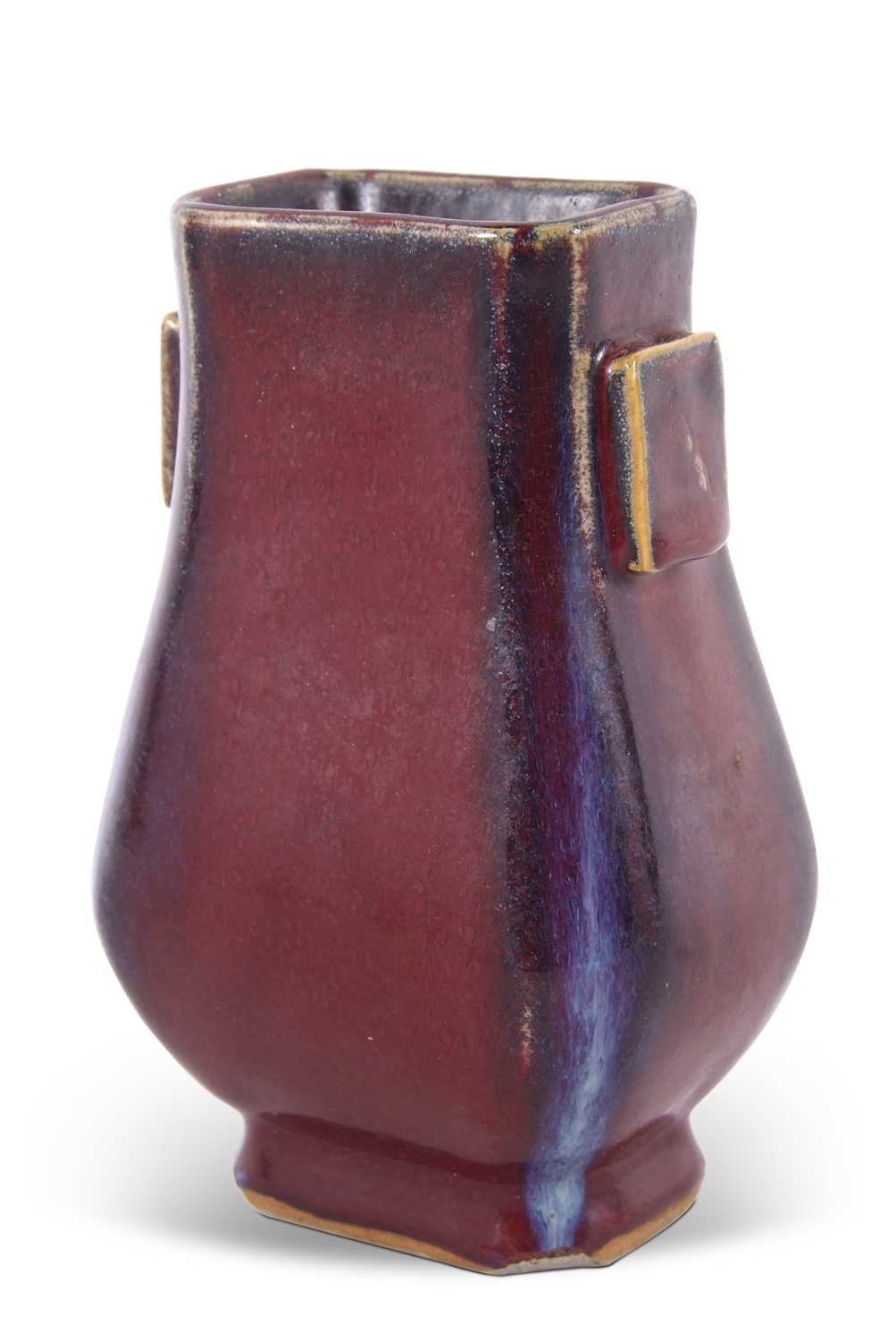 A flambe fanghu vase of archaistic form the sang de bouef or flambe ground with purple streaks