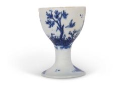 A rare Lowestoft porcelain egg cup with painted design of trees and birds, 8cm high