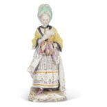 A 19th Century Meissen figure of the Race Goers Companion, cross swords mark and impressed