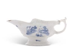 A Worcester porcelain high footed sauce boat circa 1755, decorated with a Chinoiserie scene of