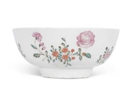 Lowestoft porcelain bowl circa 1780 with a polychrome floral design with a red dot border to