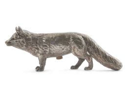 A cast silver pepperette designed to depict a fox, the head pierced with holes for pepper, later