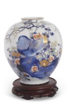 A large Japanese porcelain vase Fukugawa type, the ovoid body decorated with birds amongst flowers