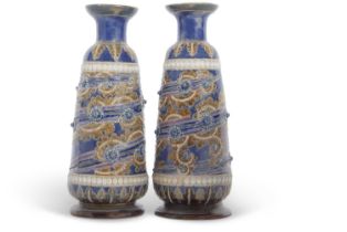 A pair of Doulton Lambeth vases by George Tinworth with typical seaweed type designs in brown on a